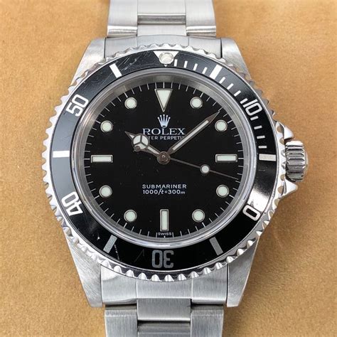 rolex submariner 14060m g serial|rolex 14060 swiss only dial.